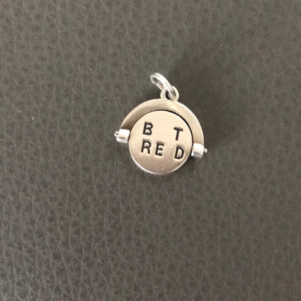 James Avery spinning best friend charm - loop has been cut.